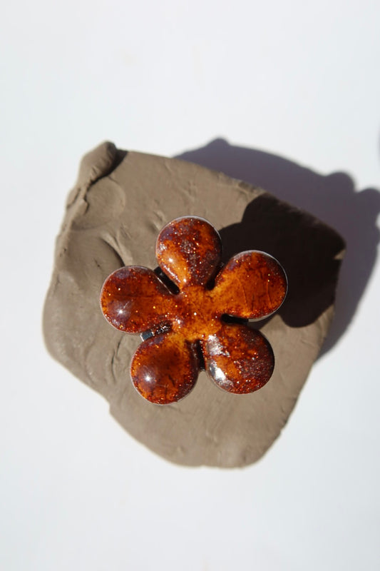 Bark ceramic flower ring with sparkling copper glaze on raw clay, made in Portugal