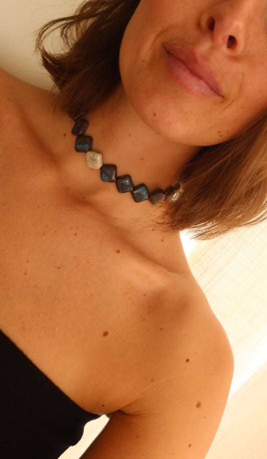 Monti handmade ceramic choker necklace in Blue Jeans and White worn by short borwn hair model — sculptural beads inspired by Roman architecture, made in Lisbon Portugal by Jadeo Studio