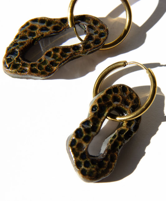 Mosca handmade ceramic earrings in Dotted Dark Green — organic sculpted clay with glossy glaze and dotted texture, statement earrings made in Lisbon Portugal by Jadeo Studio