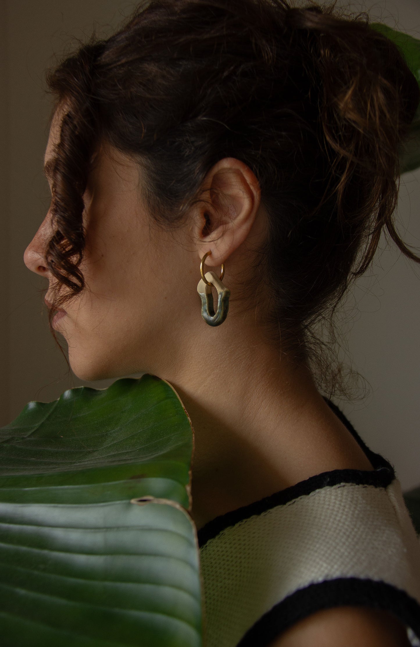 Mosca handmade ceramic earrings in Light Green — organic sculpted clay with glossy glaze, made in Lisbon Portugal by Jadeo Studio, Lisbon lifestyle