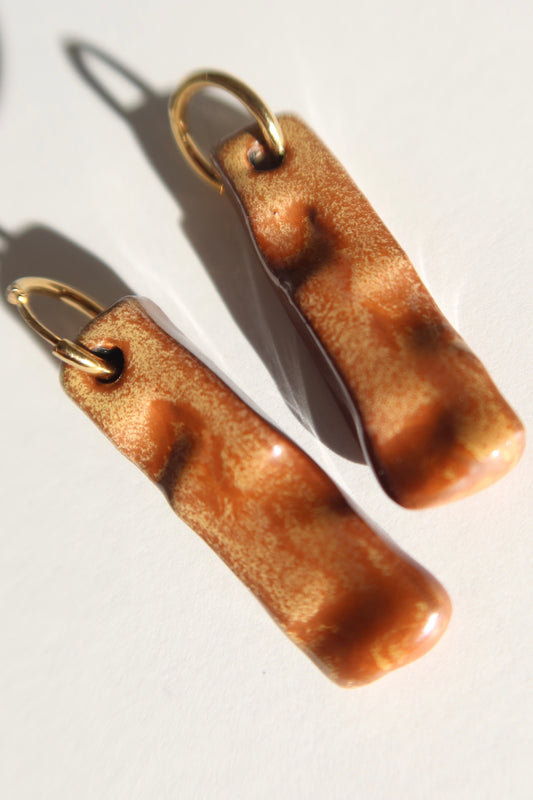 Penha handmade ceramic earrings in Sparkling Brown — minimalist rectangular drop, sculpted clay, made in Lisbon Portugal by Jadeo Studio