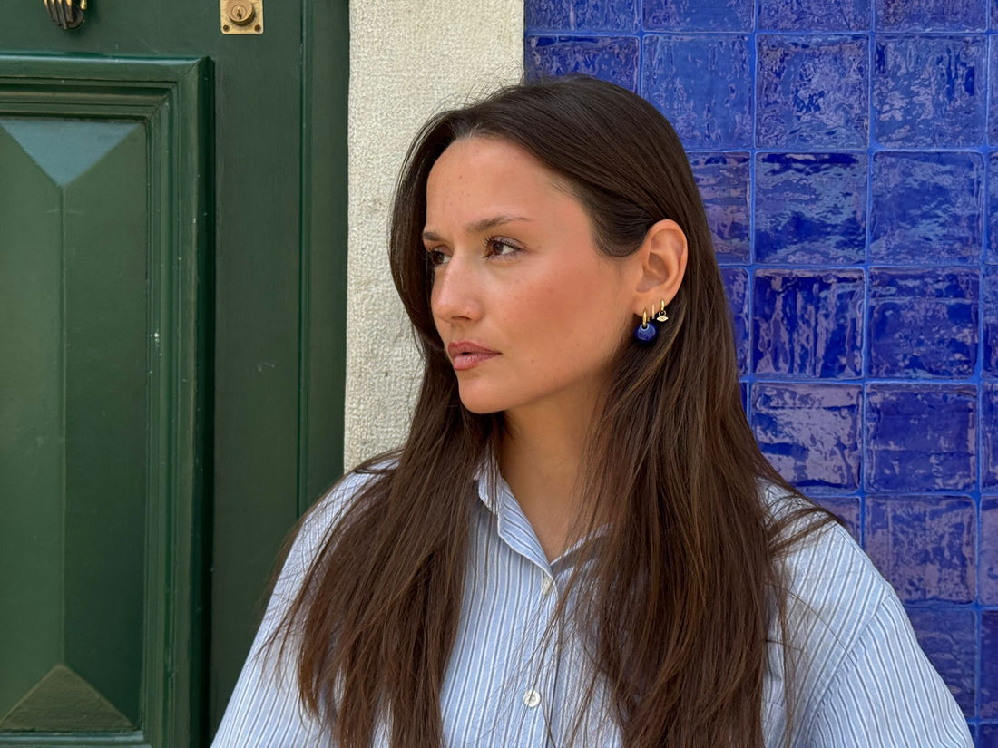 Gomes blue ceramic earrings worn in Lisbon, green door and blue tiles — Jadeo Studio