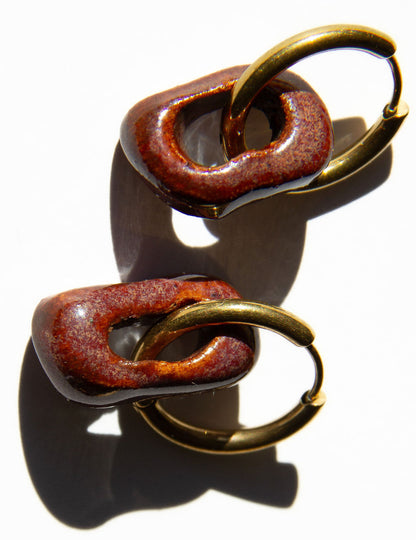 Azoia handmade ceramic earrings in Burgundy, glossy glaze — subtle small hoop, everyday elegance, made in Lisbon Portugal by Jadeo Studio