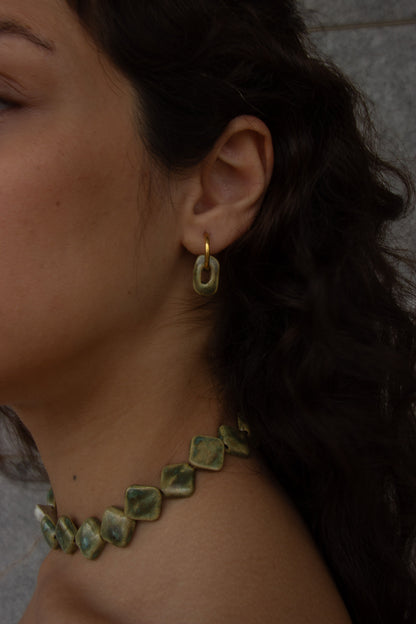 Azoia handmade ceramic earrings in Light Green — subtle small hoop, everyday elegance, made in Lisbon Portugal by Jadeo Studio, Lisbon lifestyle