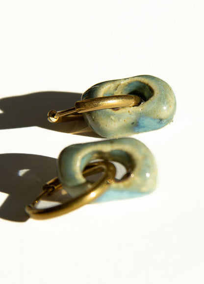 Azoia handmade ceramic earrings in Sparkling Blue — subtle small hoop, everyday elegance, made in Lisbon Portugal by Jadeo Studio, silver and gold hoop