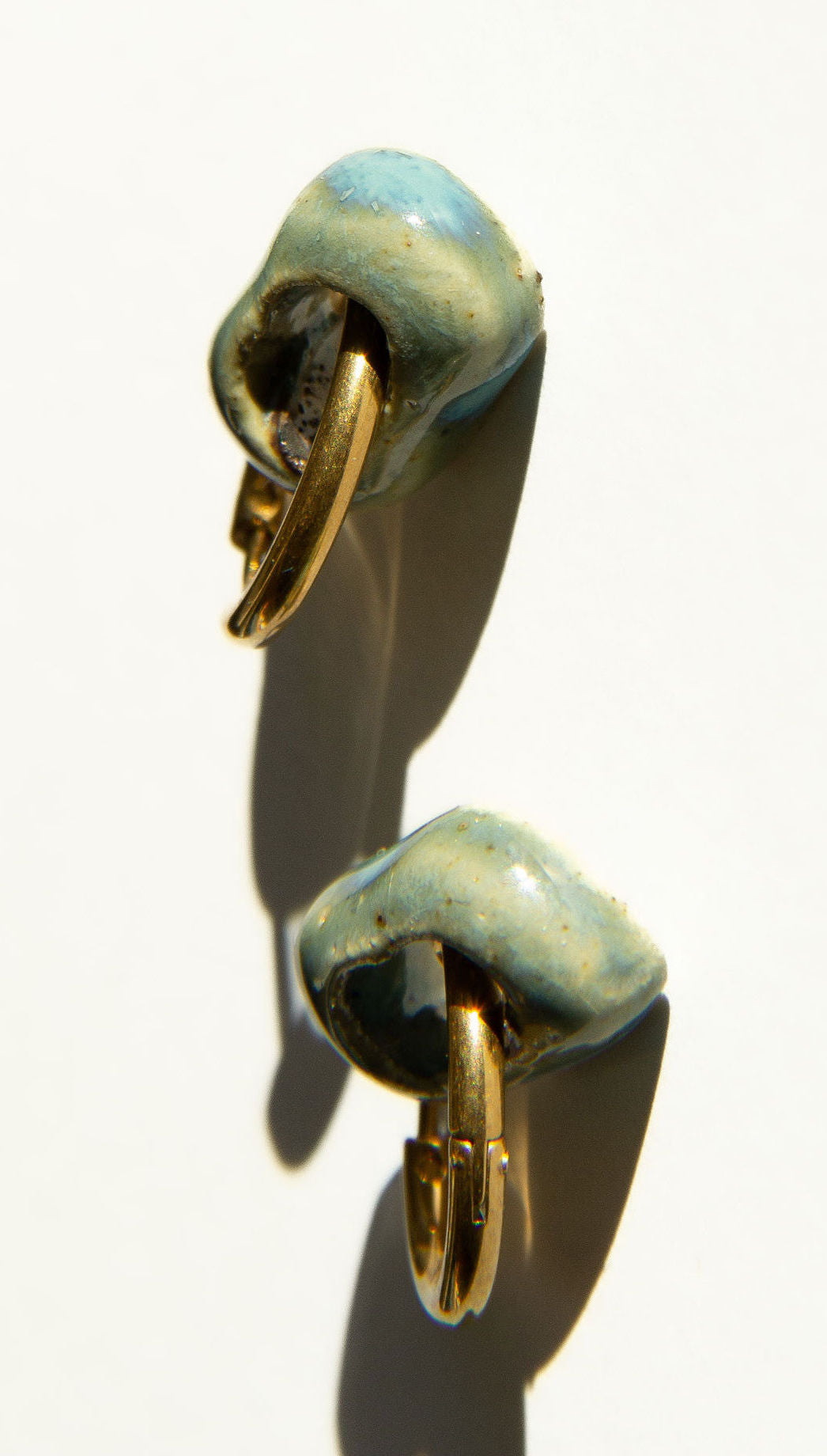 Azoia handmade ceramic earrings in Sparkling Blue — subtle small hoop, everyday elegance, statement jewelry made in Lisbon Portugal by Jadeo Studio