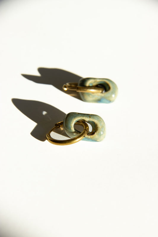 Azoia handmade ceramic earrings in Sparkling Blue — subtle small hoop, everyday elegance, made in Lisbon Portugal by Jadeo Studio
