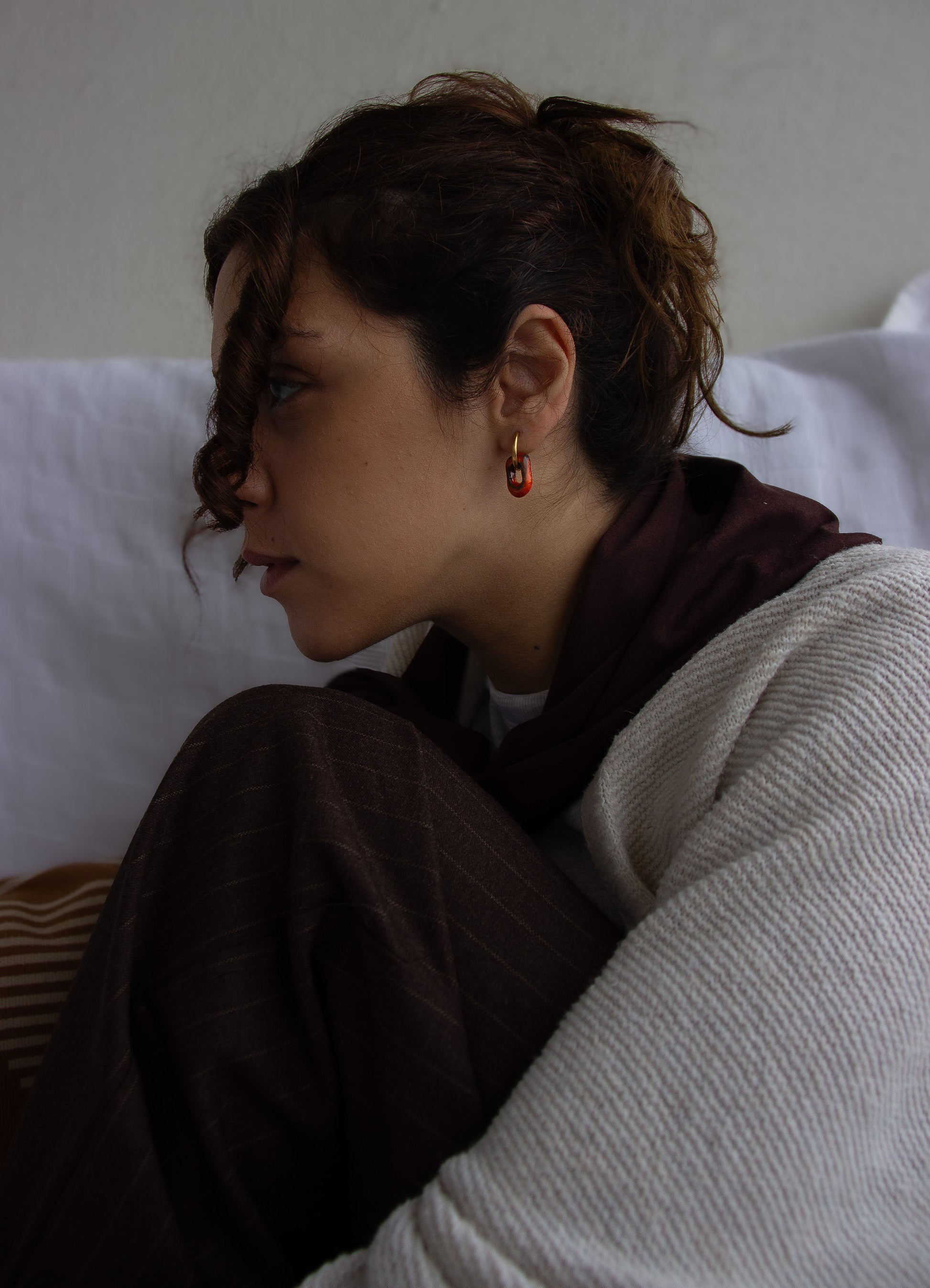 Azoia handmade ceramic earrings in Volcano on Dark Clay — subtle small hoop, everyday elegance, unique jewelry made in Lisbon Portugal by Jadeo Studio