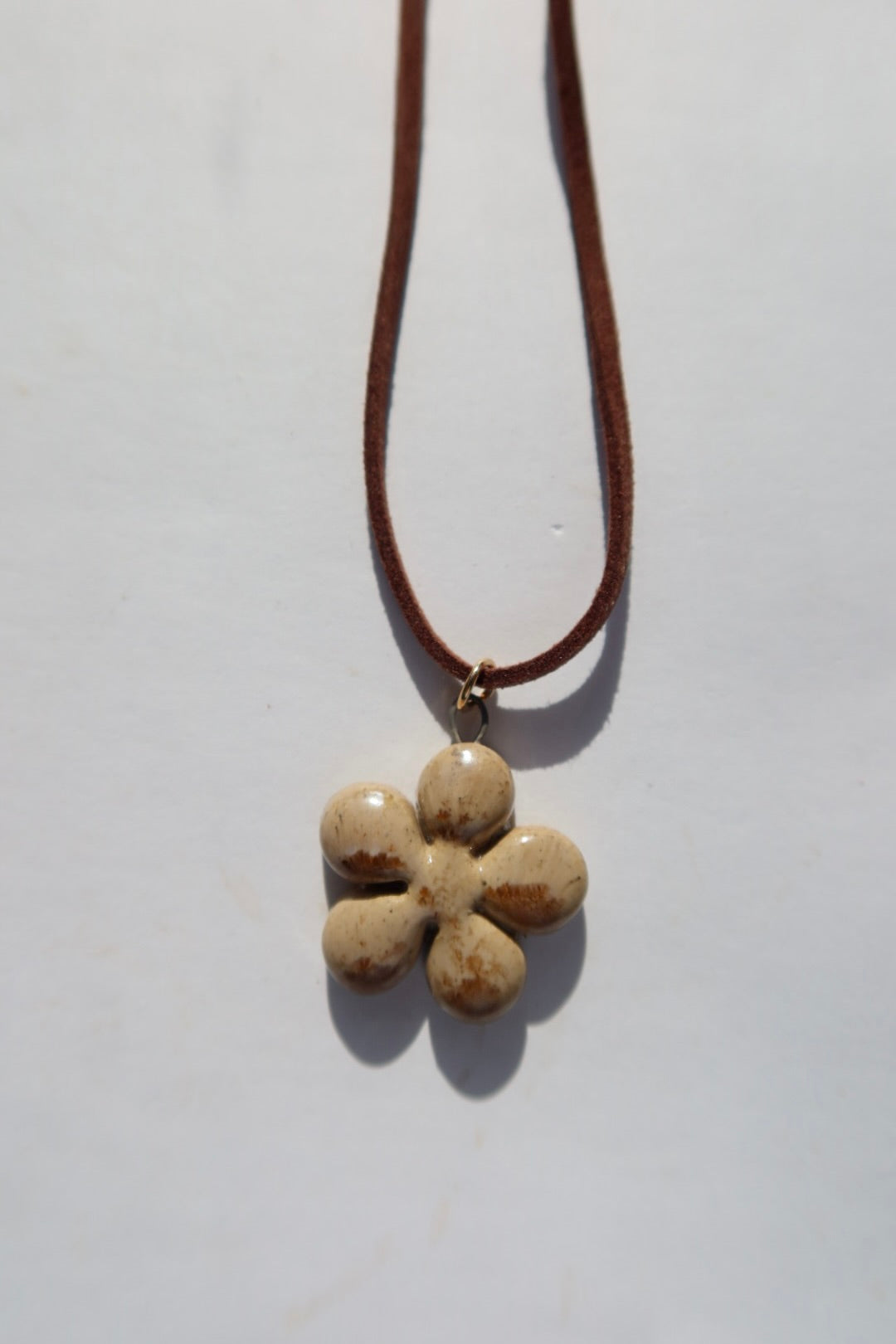 Bloom handmade ceramic flower necklace in Light Beige — inspired by Lisbon in spring, hand-sculpted, made in Portugal by Jadeo Studio, summer jewelry