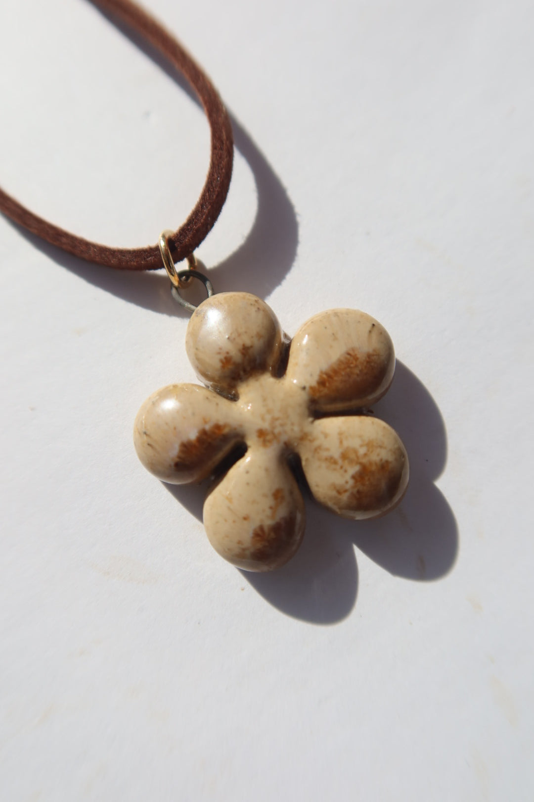 Bloom handmade ceramic flower necklace in Light Beige — inspired by Lisbon in spring, hand-sculpted, made in Portugal by Jadeo Studio