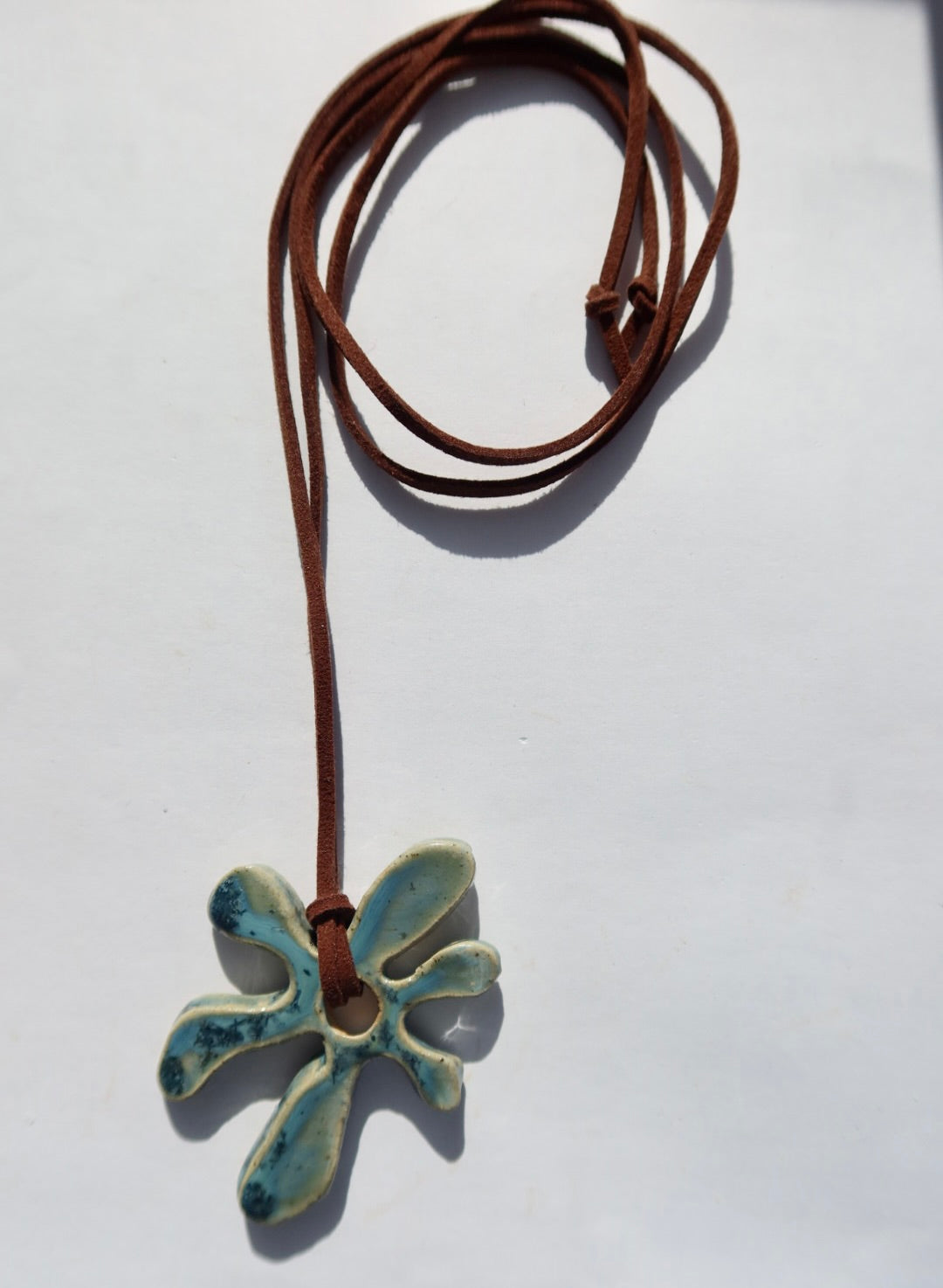 Bloom handmade ceramic flower necklace in Sparkling Blue — inspired by Lisbon in spring, hand-sculpted, made in Portugal by Jadeo Studio, summer jewelry