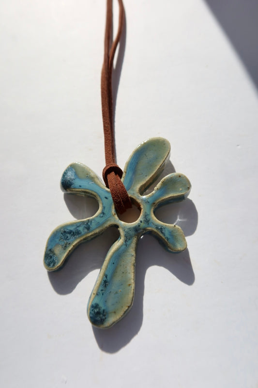 Bloom handmade ceramic flower necklace in Sparkling Blue — inspired by Lisbon in spring, hand-sculpted, made in Portugal by Jadeo Studio