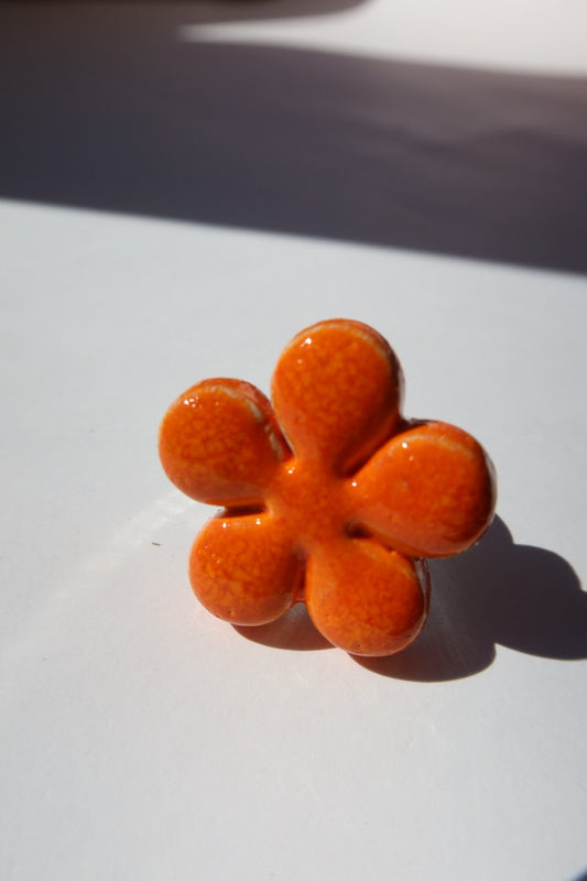 Bloom handmade ceramic flower ring in Volcano orange — bold statement ring inspired by Lisbon in spring, made in Portugal by Jadeo Studio