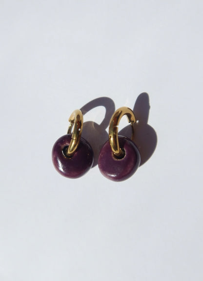 Gomes handmade ceramic earrings in Aubergine — rounded circular form, bold yet discreet, made in Lisbon Portugal by Jadeo Studio