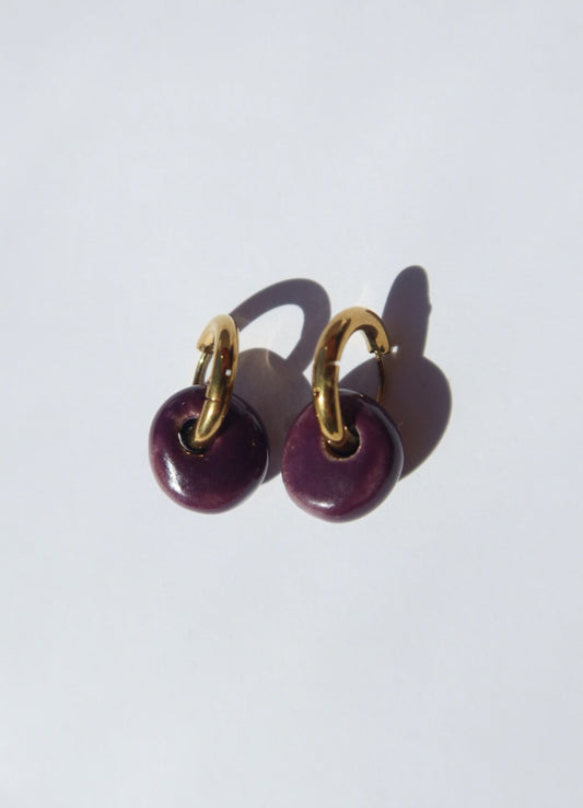 Gomes handmade ceramic earrings in Aubergine — rounded circular form, bold yet discreet, made in Lisbon Portugal by Jadeo Studio
