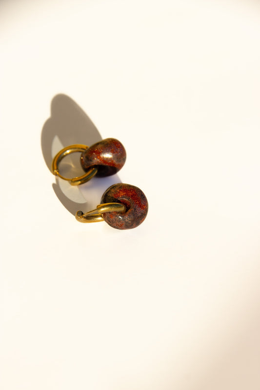 Gomes handmade ceramic earrings in Bark — rounded circular form, bold yet discreet, made in Lisbon Portugal by Jadeo Studio