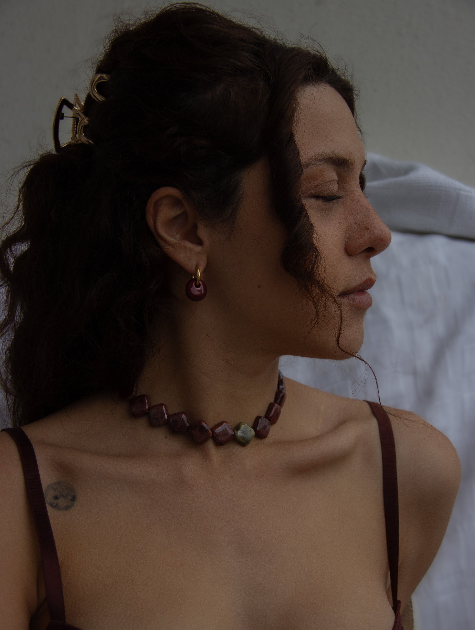 Gomes handmade ceramic earrings in Cherry — rounded circular form, bold yet discreet, statement jewelry made in Lisbon Portugal by Jadeo Studio