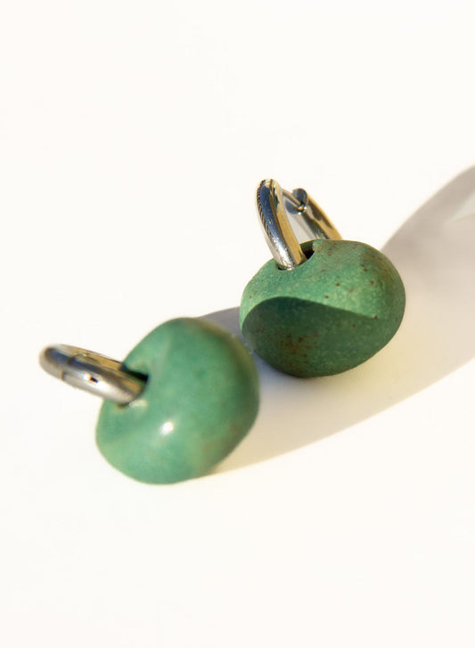 Gomes handmade ceramic earrings in Green Mat — rounded circular form, bold yet discreet, statement earrings made in Lisbon Portugal by Jadeo Studio
