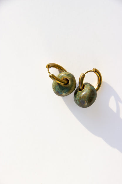 Gomes handmade ceramic earrings in Light Green — rounded circular form, bold yet discreet, made in Lisbon Portugal by Jadeo Studio, silver and gold hoop