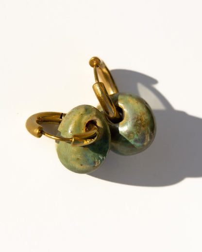 Gomes handmade ceramic earrings in Light Green — rounded circular form, bold yet discreet, made in Lisbon Portugal by Jadeo Studio
