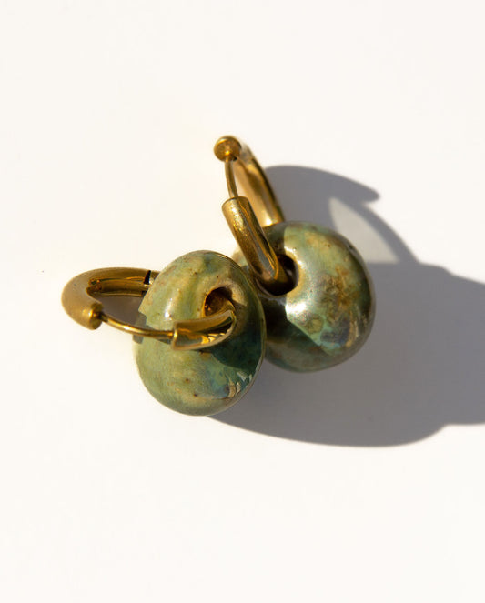 Gomes handmade ceramic earrings in Light Green — rounded circular form, bold yet discreet, made in Lisbon Portugal by Jadeo Studio