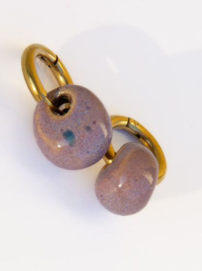 Gomes handmade ceramic earrings in Purple Blue, glossy glaze — rounded circular form, bold yet discreet, made in Lisbon Portugal by Jadeo Studio