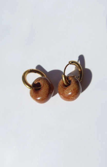 Gomes handmade ceramic earrings in Sparkling Brown — rounded circular form, bold yet discreet, made in Lisbon Portugal by Jadeo Studio