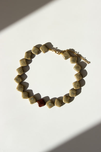 Monti handmade ceramic choker necklace in Beige and Burgundy — sculptural beads inspired by Roman architecture, made in Lisbon Portugal by Jadeo Studio