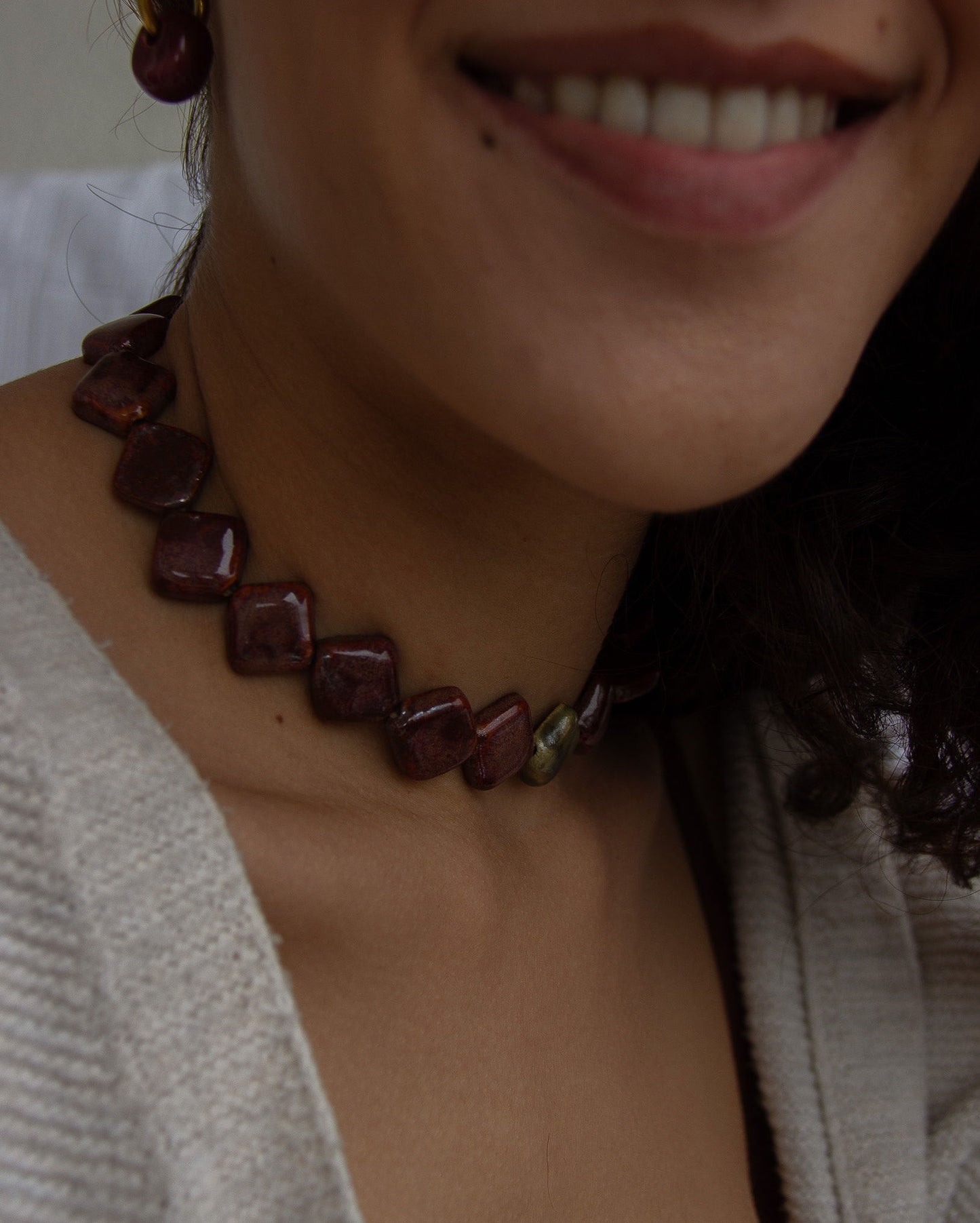 Monti handmade ceramic choker necklace in Burgundy and Light Green — sculptural beads inspired by Roman architecture, made in Lisbon Portugal by Jadeo Studio, square beads