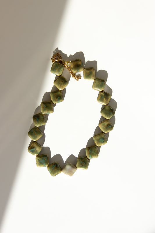 Monti handmade ceramic choker necklace in Light Green  and Sparkling White — sculptural beads inspired by Roman architecture, made in Lisbon Portugal by Jadeo Studio