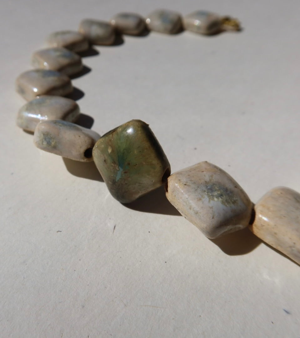 Monti handmade ceramic choker necklace in Sparkling White and Light Green, glossy glaze — sculptural beads inspired by Roman architecture, made in Lisbon Portugal by Jadeo Studio