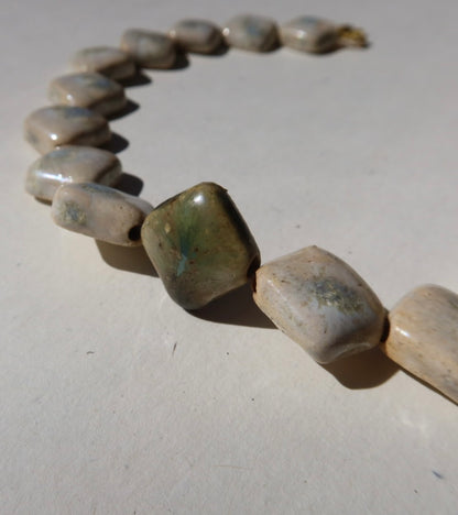Monti handmade ceramic choker necklace in Sparkling White and Light Green, glossy glaze — sculptural beads inspired by Roman architecture, made in Lisbon Portugal by Jadeo Studio