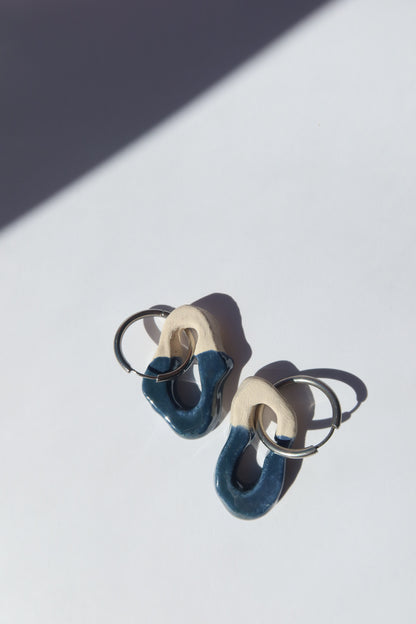 Mosca handmade ceramic earrings in Blue Green — organic sculpted clay with glossy glaze, made in Lisbon Portugal by Jadeo Studio, Lisbon lifestyl