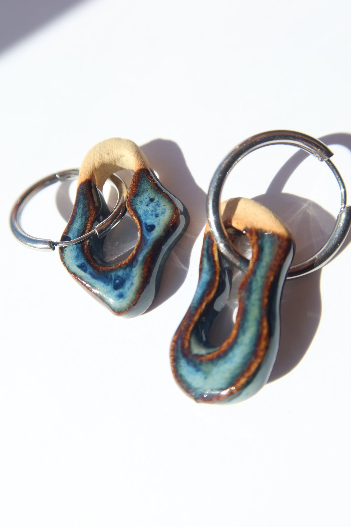 Mosca handmade ceramic earrings in Blue Jeans — organic sculpted clay with glossy glaze, statement jewelry made in Lisbon Portugal by Jadeo Studio