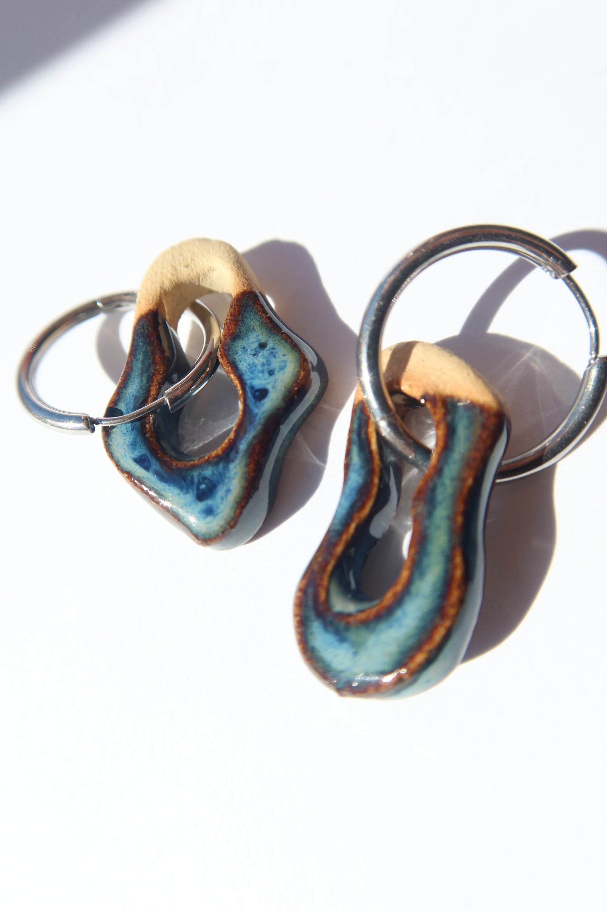 Mosca handmade ceramic earrings in Blue Jeans — organic sculpted clay with glossy glaze, statement jewelry made in Lisbon Portugal by Jadeo Studio