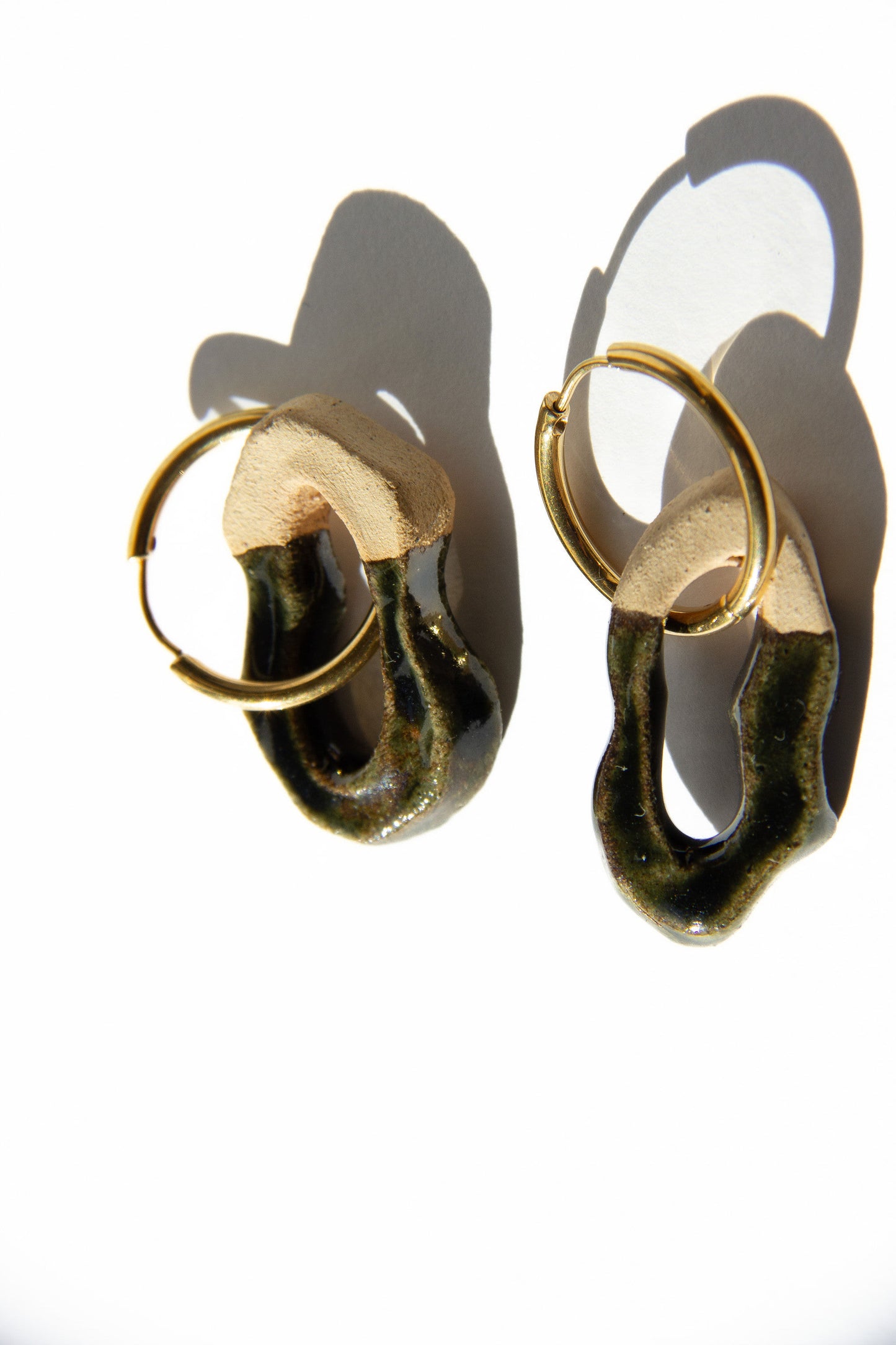 Mosca handmade ceramic earrings in Dark Green — organic sculpted clay with glossy glaze, statement earrings made in Lisbon Portugal by Jadeo Studio