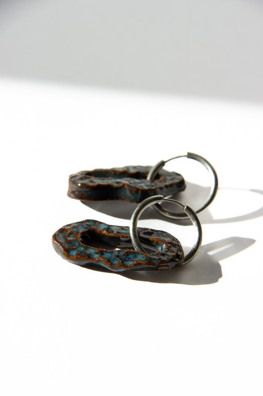 Mosca handmade ceramic earrings in Dotted Blue Jeans — organic sculpted clay with glossy glaze and dotted texture, statement jewlery made in Lisbon Portugal by Jadeo Studio