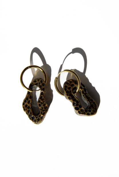 Mosca handmade ceramic earrings in Dotted Dark Green — organic sculpted clay with glossy glaze and dotted texture, made in Lisbon Portugal by Jadeo Studio