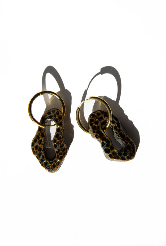 Mosca handmade ceramic earrings in Dotted Dark Green — organic sculpted clay with glossy glaze and dotted texture, made in Lisbon Portugal by Jadeo Studio