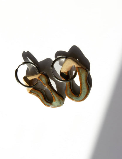 Mosca handmade ceramic earrings in Grey Green — organic sculpted clay with glossy glaze, made in Lisbon Portugal by Jadeo Studio