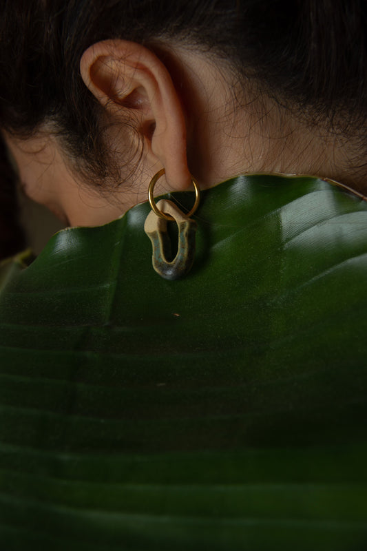 Mosca handmade ceramic earrings in Light Green — organic sculpted clay with glossy glaze, made in Lisbon Portugal by Jadeo Studio, nature inspiration