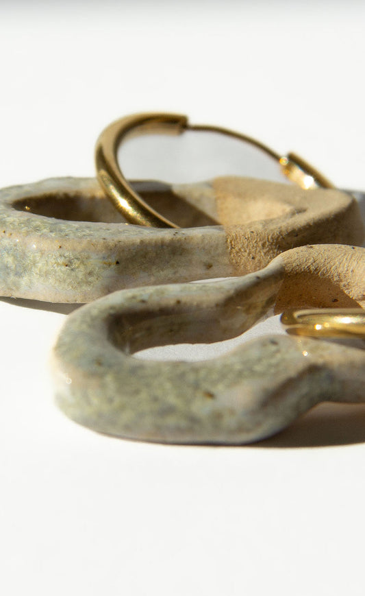 Mosca handmade ceramic earrings in Sparkling White — organic sculpted clay with glossy glaze, statement jewelry made in Lisbon Portugal by Jadeo Studio