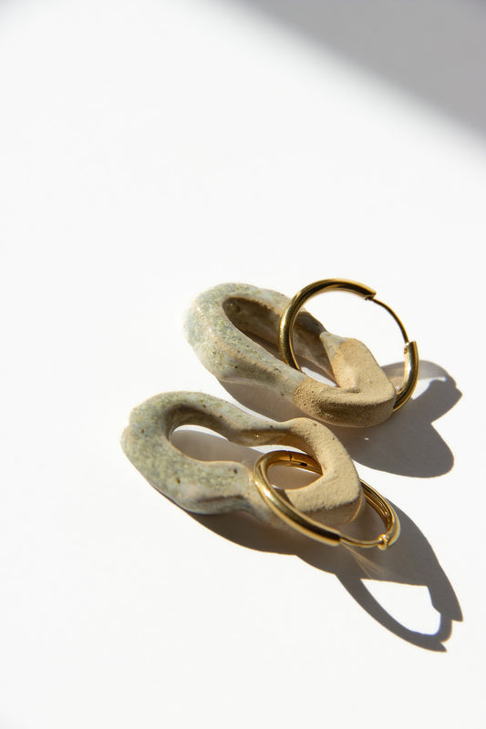 Mosca handmade ceramic earrings in Sparkling White — organic sculpted clay with glossy glaze, made in Lisbon Portugal by Jadeo Studio