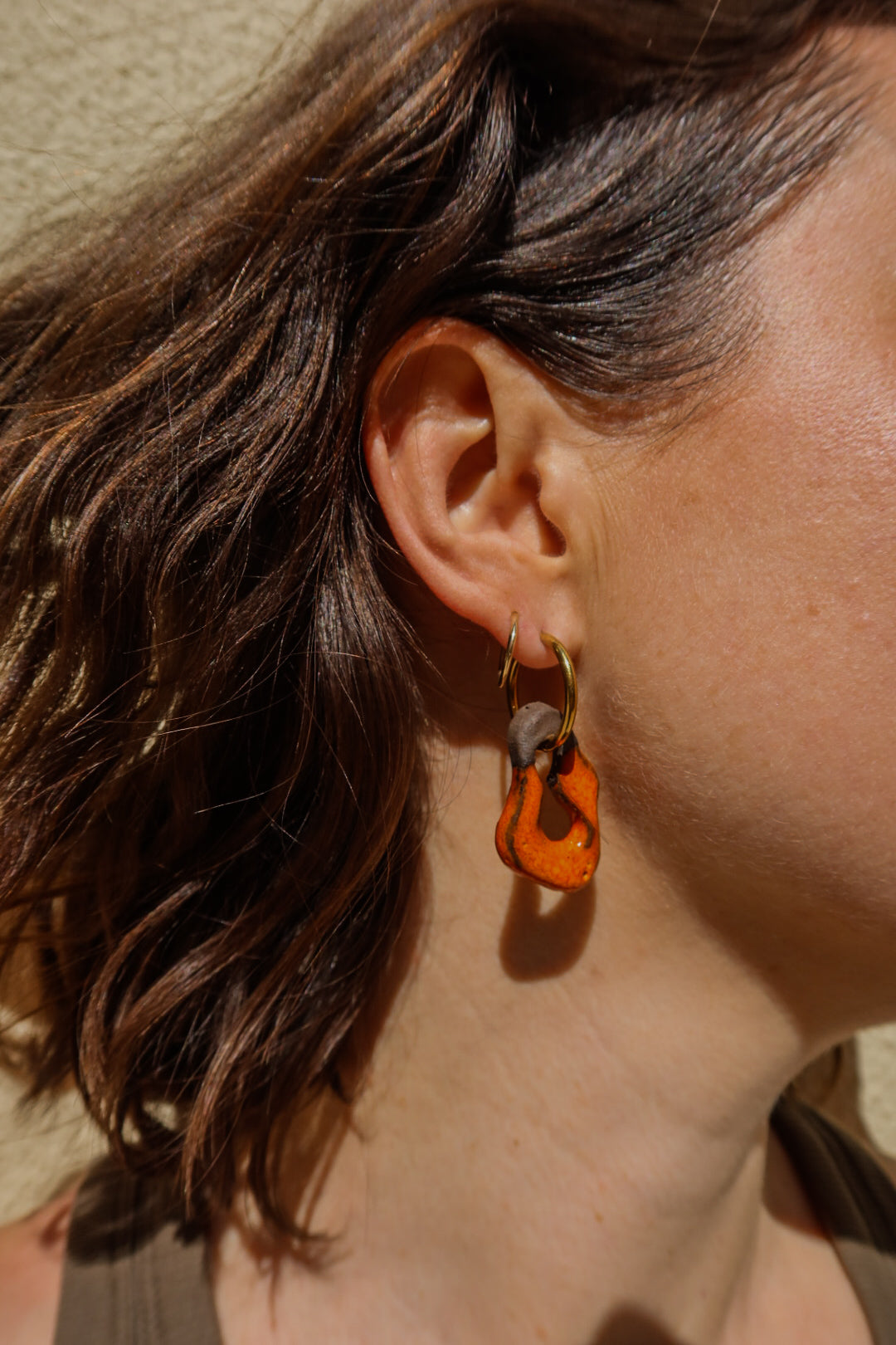 Mosca handmade ceramic earrings in Volcano on Dark Clay — organic sculpted clay with glossy glaze, made in Lisbon Portugal by Jadeo Studio, earth fired