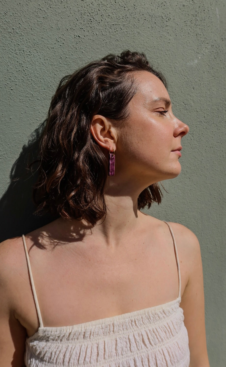Penha handmade ceramic earrings in Aubergine — minimalist rectangular drop, sculpted clay, made in Lisbon Portugal by Jadeo Studio, wearable art