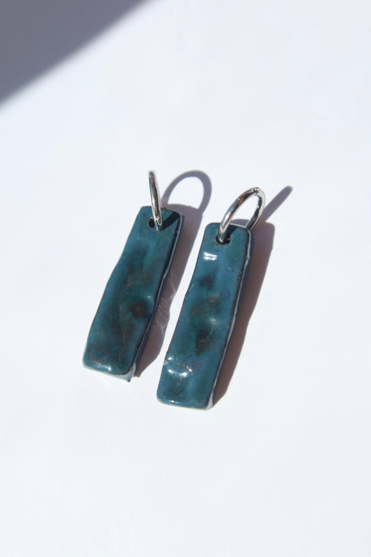Penha handmade ceramic earrings in Blue Green — minimalist rectangular drop, sculpted clay, made in Lisbon Portugal by Jadeo Studio