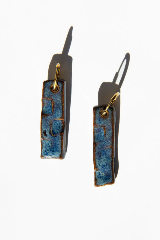 Penha handmade ceramic earrings in Blue Jeans — minimalist rectangular drop, sculpted clay, made in Lisbon Portugal by Jadeo Studio