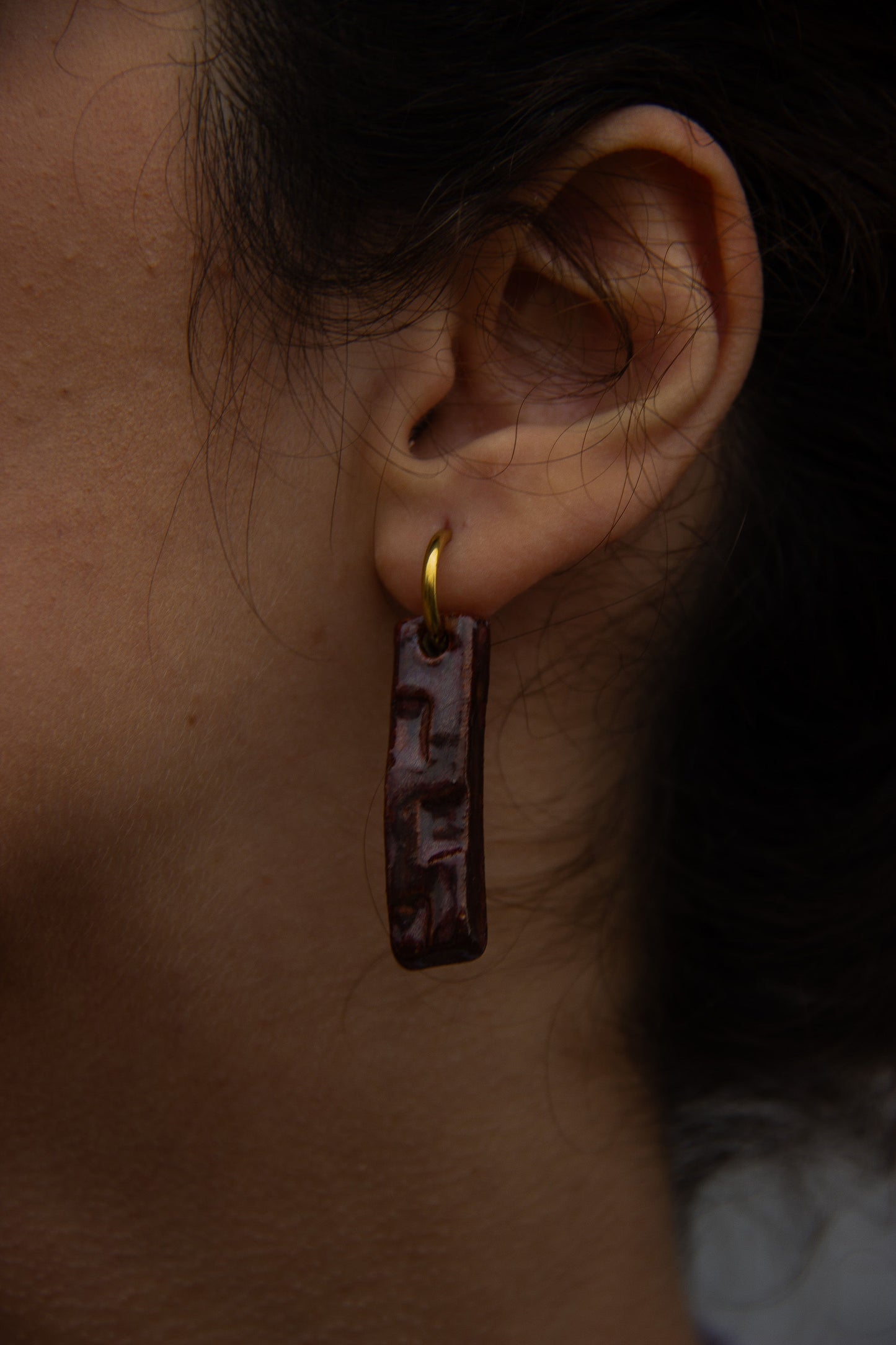 Penha handmade ceramic earrings in Burgundy — minimalist rectangular drop, sculpted clay, made in Lisbon Portugal by Jadeo Studio;, silver and gold hoop