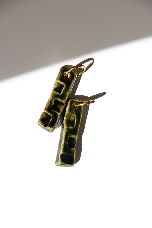 Penha handmade ceramic earrings in Dark Green — minimalist rectangular drop, sculpted clay, made in Lisbon Portugal by Jadeo Studio