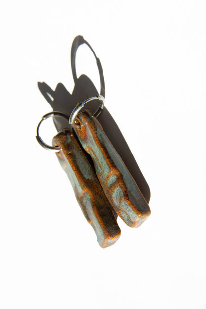 Penha handmade ceramic earrings in Grey Green — minimalist rectangular drop, sculpted clay, made in Lisbon Portugal by Jadeo Studio, unique jewlery